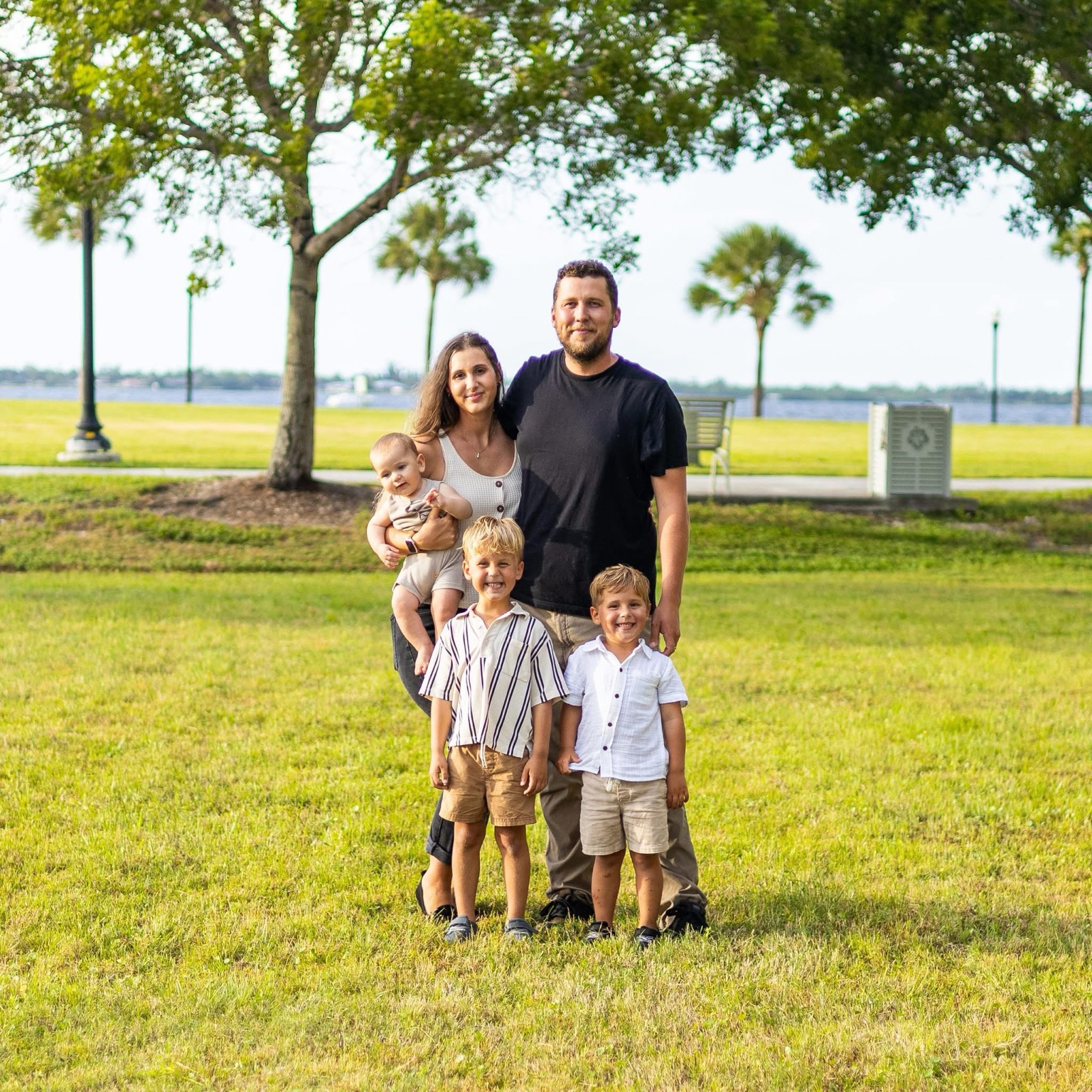 The Fat Cow Tallow family together outdoors by the water